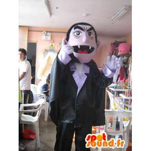 Vampire mascot dressed in a suit and a black cape - MASFR006047 - Monsters mascots