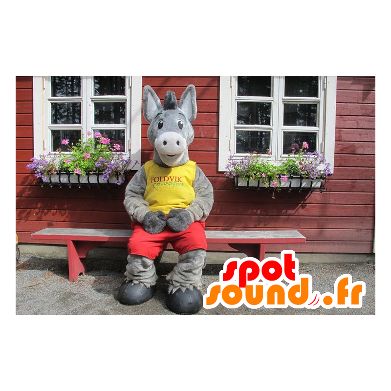 Grijze ezel mascotte houdt geel en rood - MASFR21789 - vee