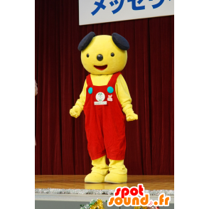 Mascot perro amarillo y negro con un mono rojo - MASFR25471 - Yuru-Chara mascotas japonesas