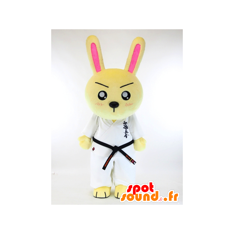 Judoka gul kaninmaskot med en hvid kimono - Spotsound maskot