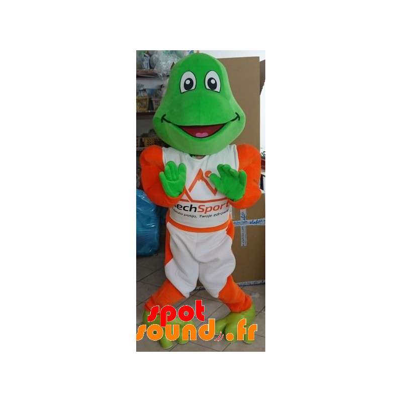 カエルのマスコット の 白とオレンジ色の服を着て緑のカエルのマスコット
